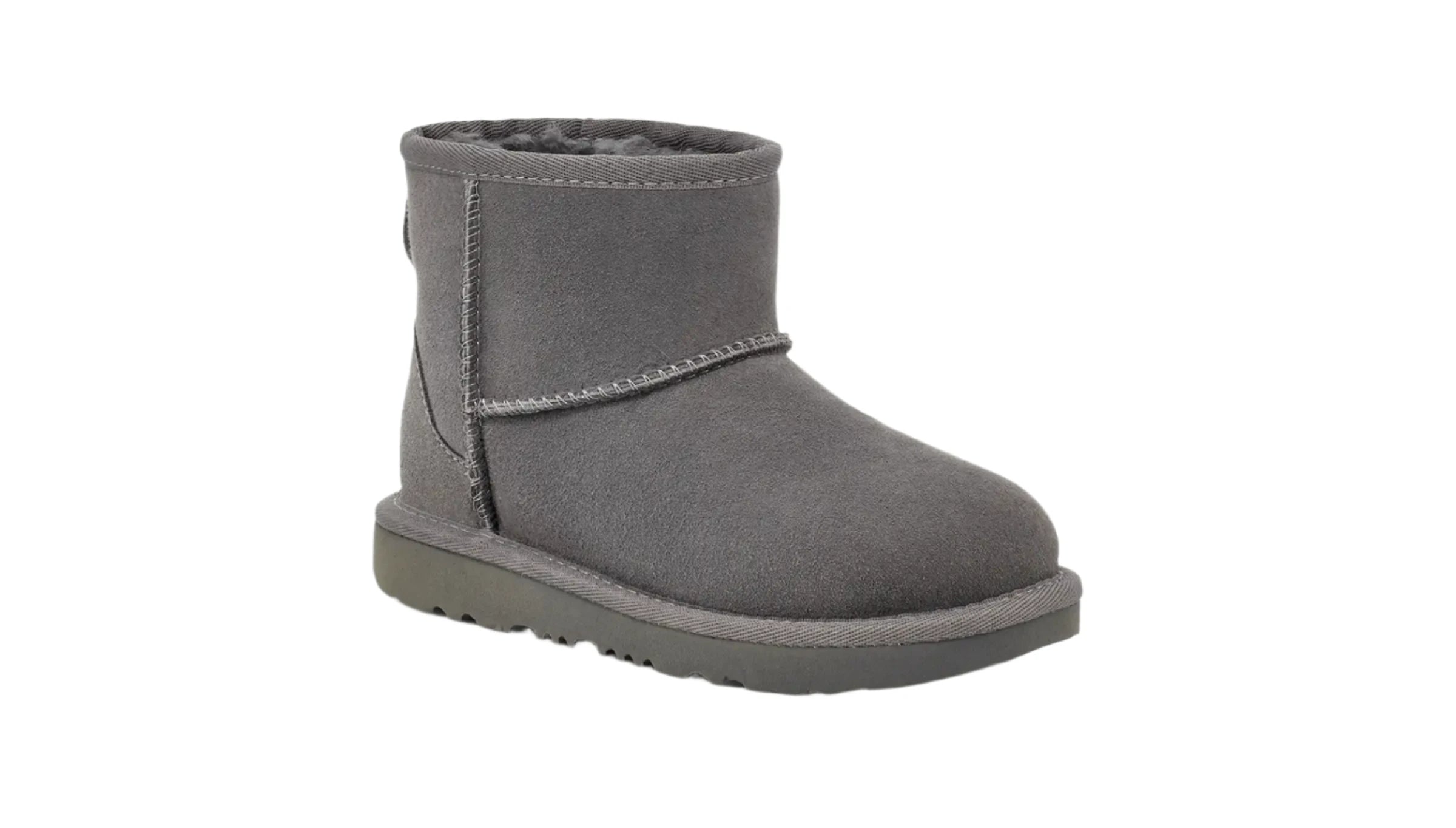 The diagonal view of the Kid's Ugg Classic shows the great stitching