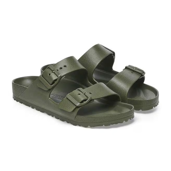 The upper of this shoe is two large straps with buckles on the lateral sides. 