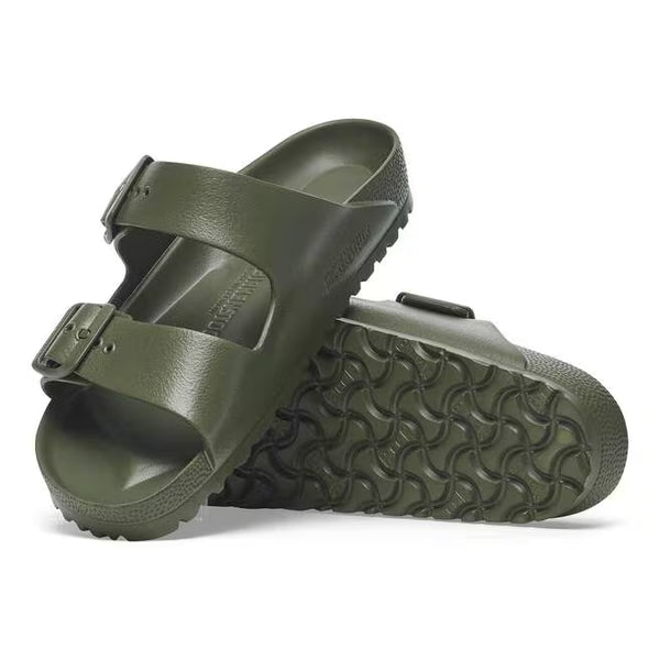 The outsole of this shoe is green and has a geometric pattern. Birkenstock is stamped into the upper on the medial side. 