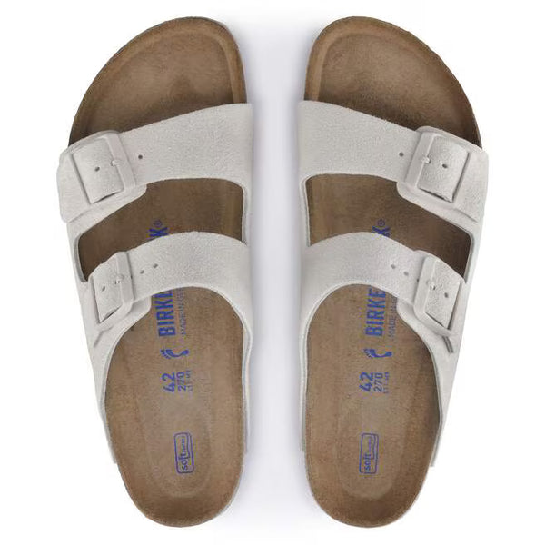 The upper of this shoe is two large straps with buckles on the lateral sides. 