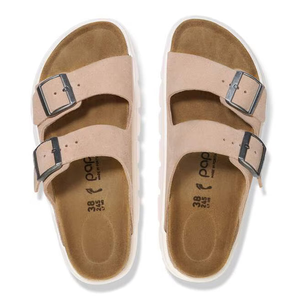 The upper of this shoe is two large straps with buckles on the lateral sides. 