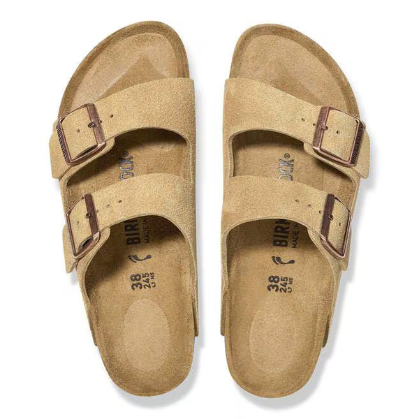 The upper of this shoe is two large straps with buckles on the lateral sides. 