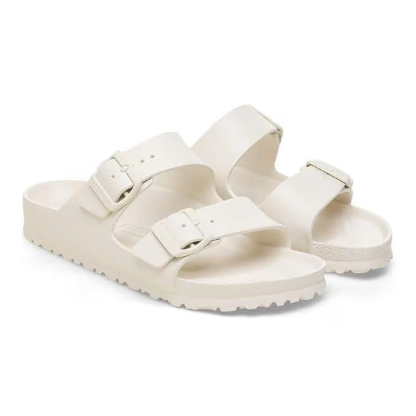 The upper of this shoe is two large straps with buckles on the lateral sides. 