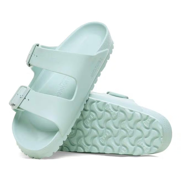 The outsole of this shoe is seafoam green and has a geometric pattern. Birkenstock is stamped into the upper on the medial side. 