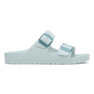 Light green sandals with white straps on a white background