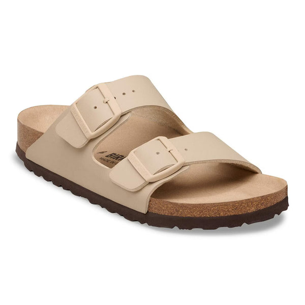 Tan 2 strap sandal on a white background