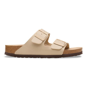 Tan 2 strap sandal on a white background