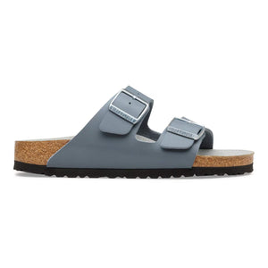 Slate grey sandal with a cork midsole on a white background