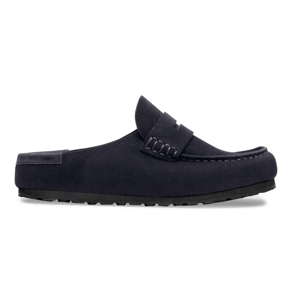 Navy suede loafer style clog on a white background