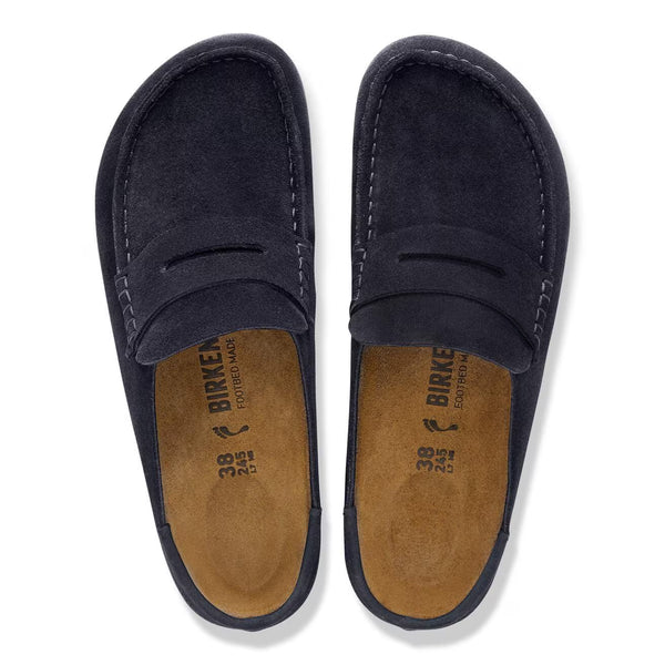 Navy suede loafer style clog on a white background
