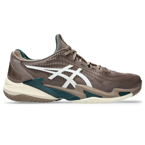 Brown  and white tennis shoe with white and green accents on a white background.
