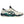 White tennis shoe with green and black accents on a white background.