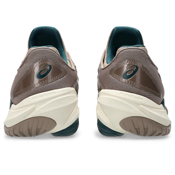 Pair of brown and white Men's ASICS tennis shoes with white soles on a white background.