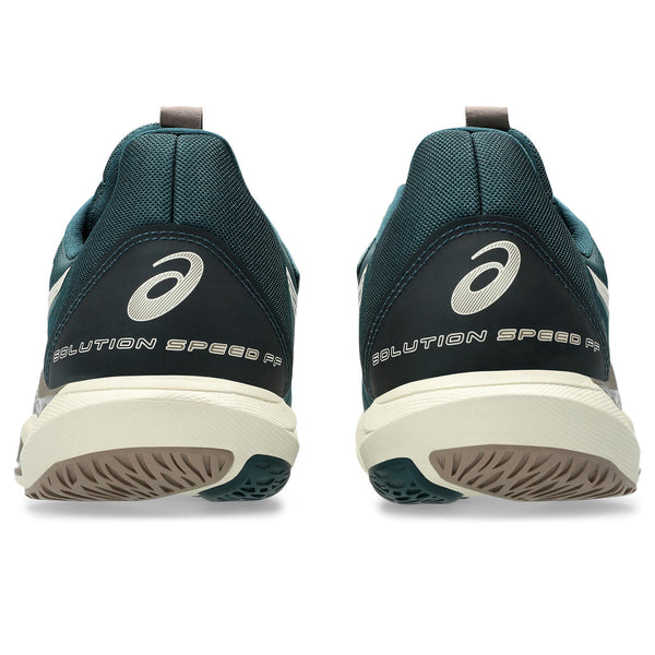 The heel of these tennis shoes have the style name, Solution Speed FF, in big lettering.