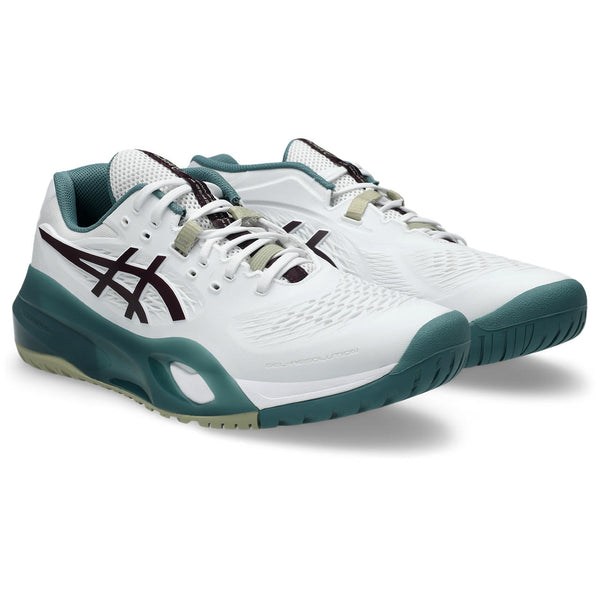 White and green athletic shoes with brand logo on a white background