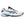 White sports shoe with black and green accents on a white background