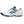White sports shoe with black and teal accents on a white background