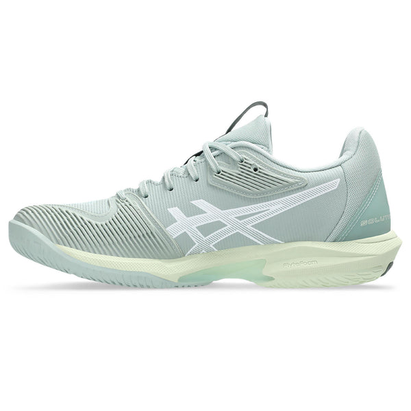 The medial side of a light blue athletic shoe with white logo on a white background