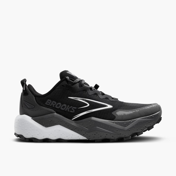Black running shoe with white sole on a light gray background