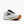 White running shoe with black and brown accents on a white background