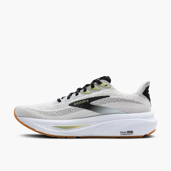 The medial side a Brooks running shoe with a mostly white and grey upper.