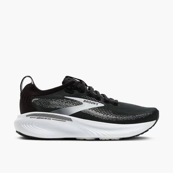 Black running shoe with white sole on a white background