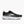 Black running shoe with white sole on a light gray background