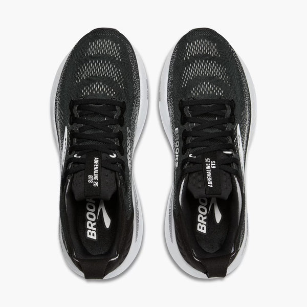 Black running shoe with white sole on a white background