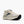 Cream running shoe on white background