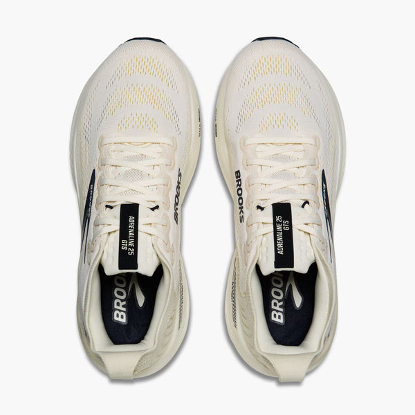 Cream running shoe on white background