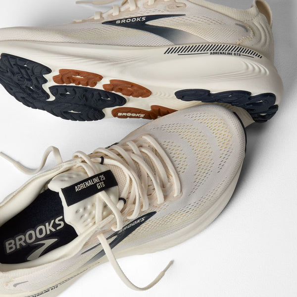 Cream running shoe on white background