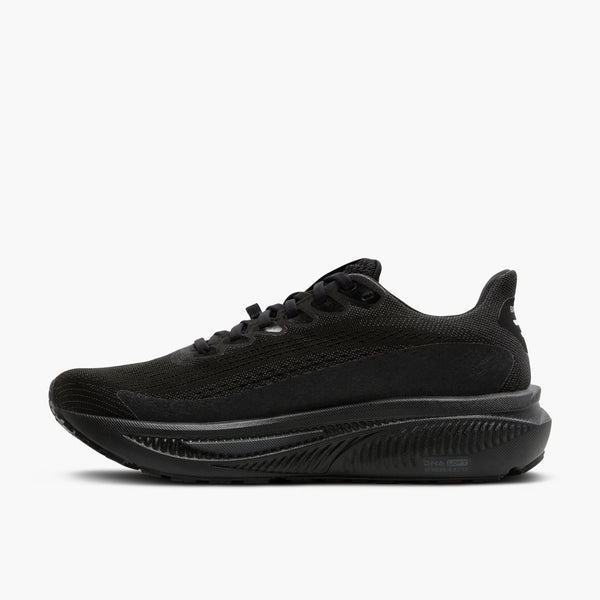 Black athletic shoe on a gray background