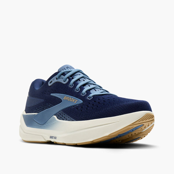 Blue running shoe with white sole on a white background