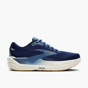 Navy running shoe with white sole on a white background
