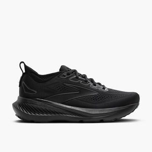 Black running shoe with orange logo on a light gray background