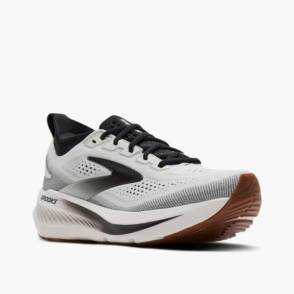 a black brooks logo is in the middle of the upper on the lateral side
