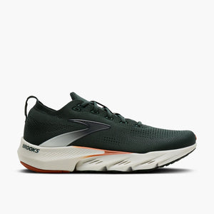 Brooks running shoe in dark forest green with a white and gray midsole and a small orange accent, shown from the side on a light gray background.