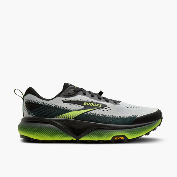 The Brooks Cascadia trail shoe has a neon green midsole with some black.