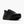 A black low-top athletic shoe with a textured leather upper, matching black laces, and a thick black sole, shown from a three-quarters angle on a light gray background.