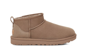 Light brown ankle boot on a white background