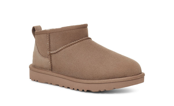 Light brown ankle boot on a white background