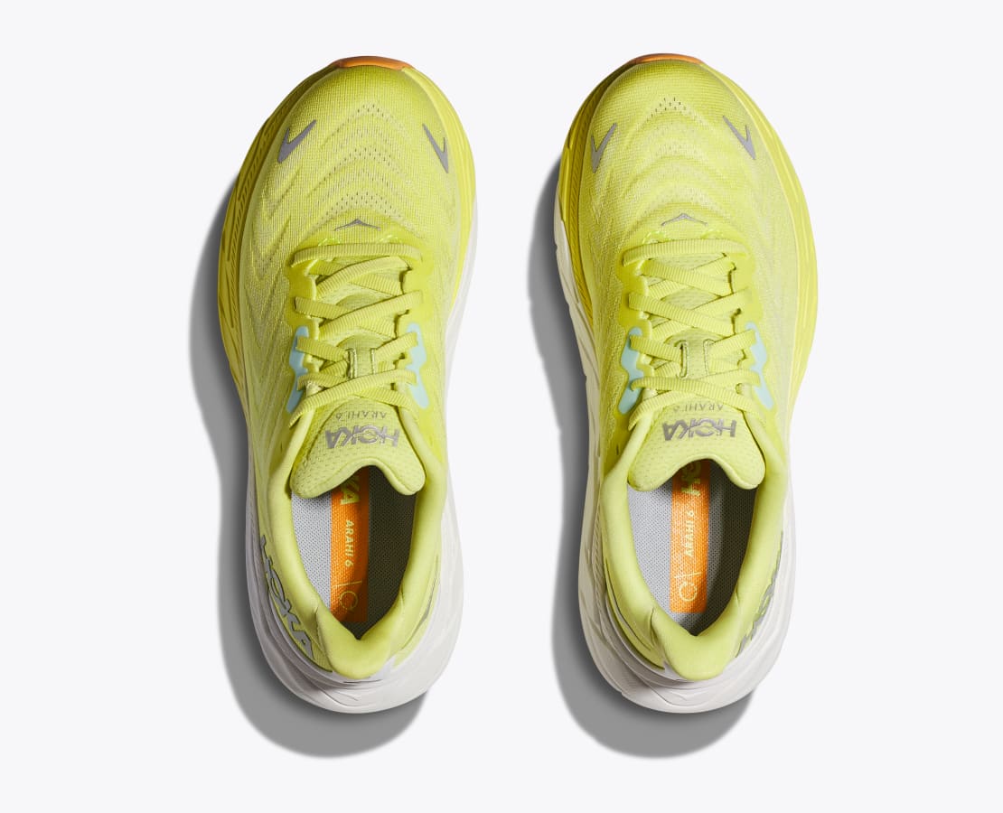 Top view of the Women's Arahi 6 by HOKA in the color Citrus Glow/White