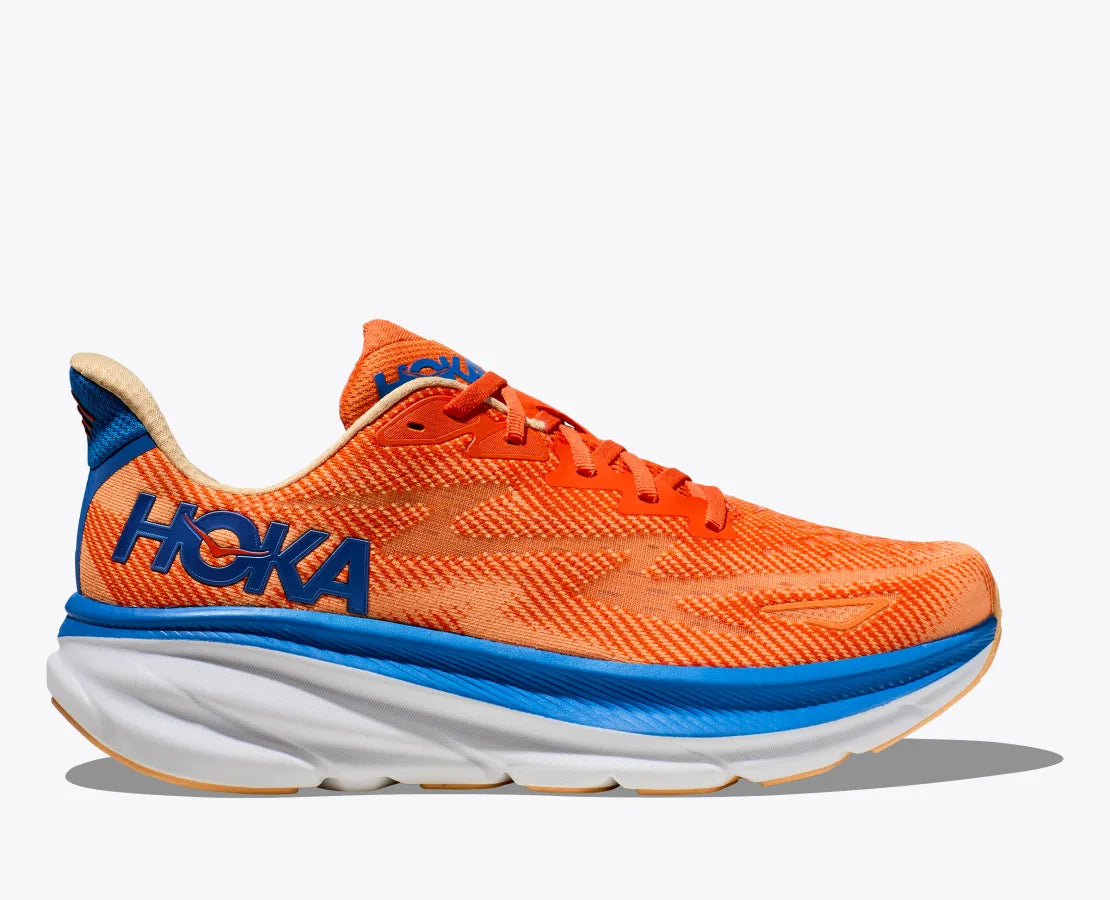 This Clifton 9 is the wide fit and is a bright orange with a blue Hoka Logo