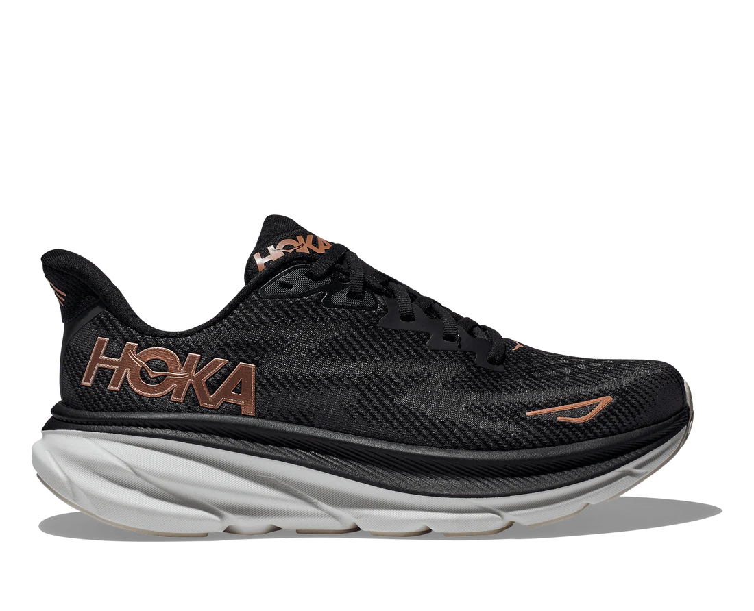 Lateral view of the Women's Clifton 9 by HOKA in Black/Copper