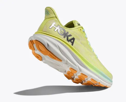 Back angle view of the Women's Clifton 9 by HOKA in the color Citrus Glow/Sunlit Ocean