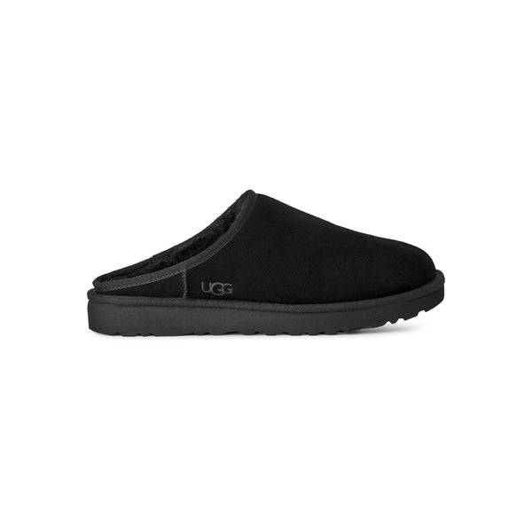 Black slip on slipper on a white background