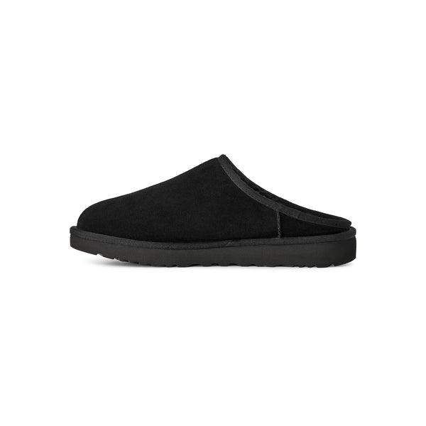 Black slip on slipper on a white background