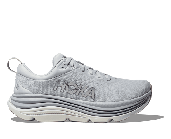 A white Hoka running shoe with a mesh upper and a thick white sole.