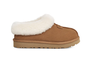 Sherling and tan slipper on a white background