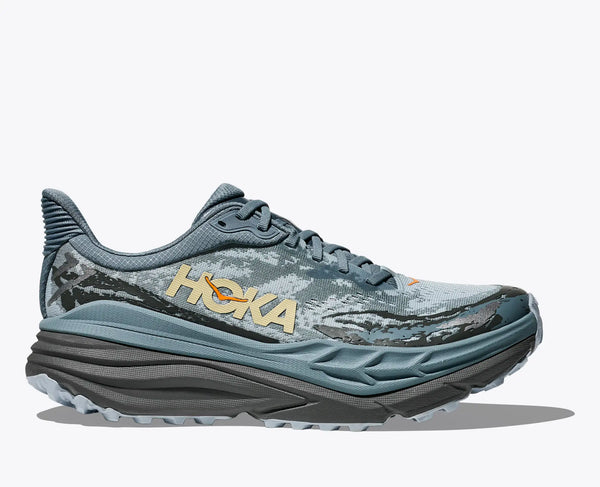 Blue running shoe with 'Hoka' branding on a white background